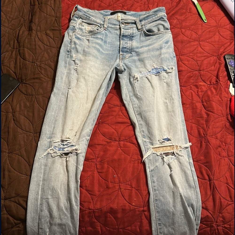 Distressed Light Blue Jeans